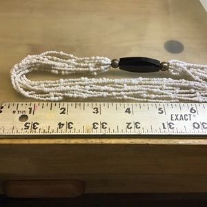 Silpada Beaded necklace with two large beads name brand on clasp on back.